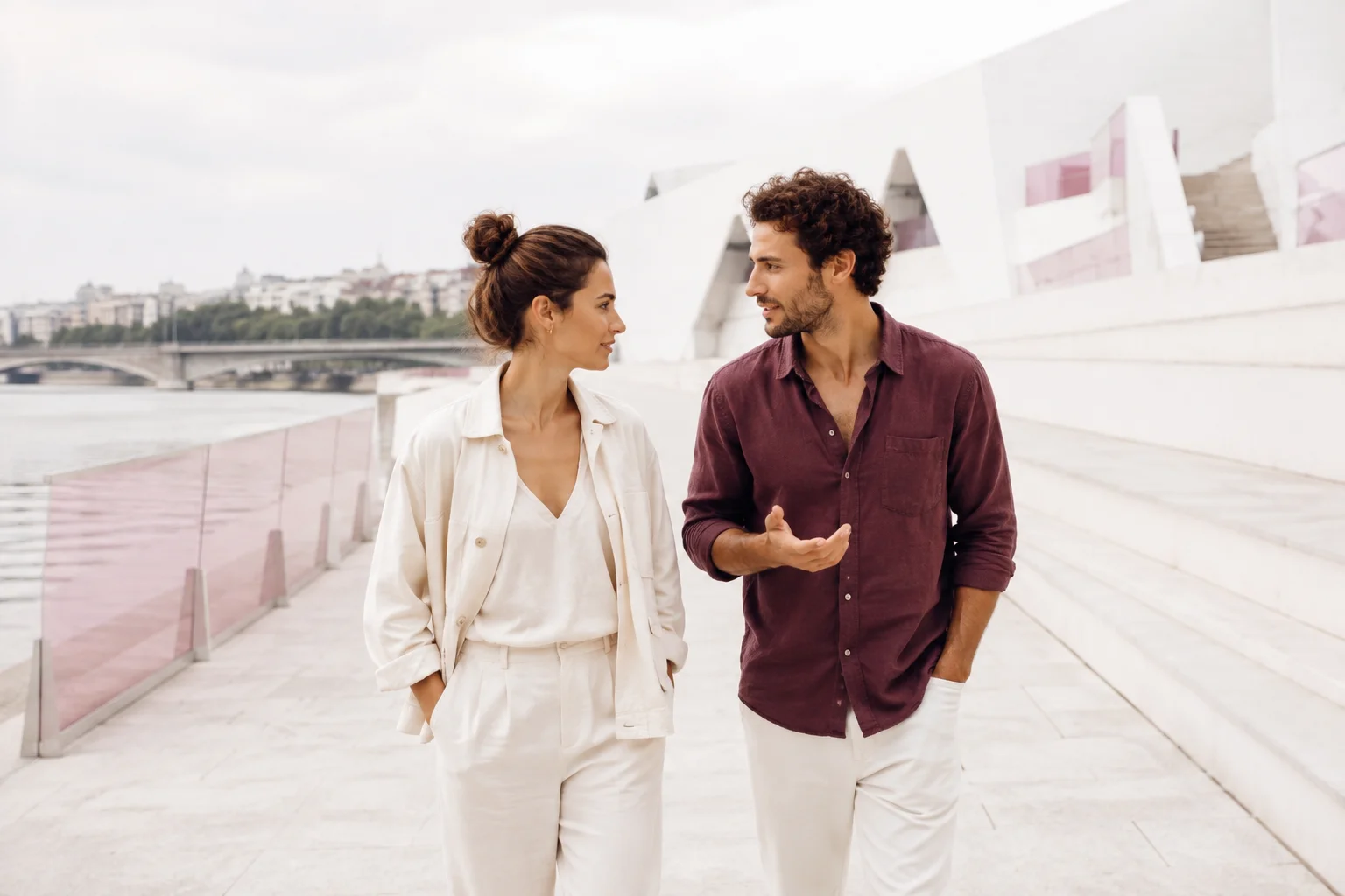The couple getting to know each other on a daytime walk