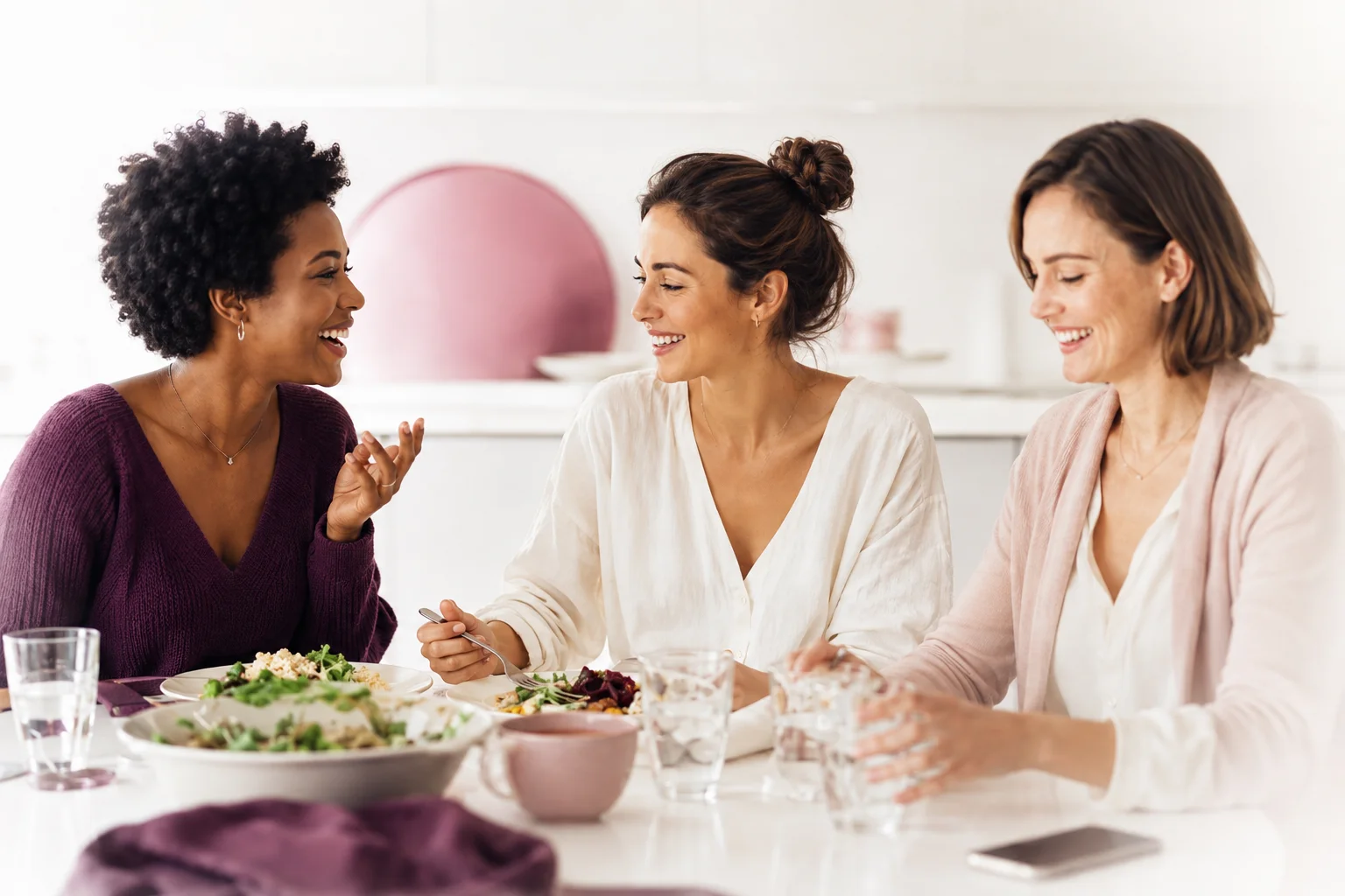 A woman enjoying dinner with her friends